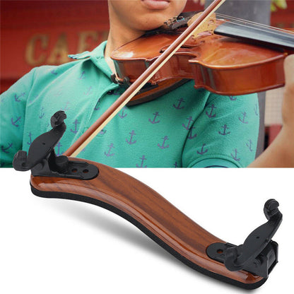 Violin shoulder rest with a wooden finish, designed for comfort and stability during play.